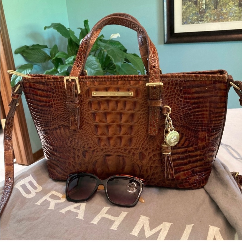 Brahmin Asher tote/shoulder bag. Sunglasses help show the size of this bag.